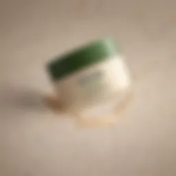 Close-up of Aveeno Anti-Aging Face Cream jar showcasing its texture