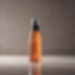 Close-up of a hair mist spray bottle against a natural background