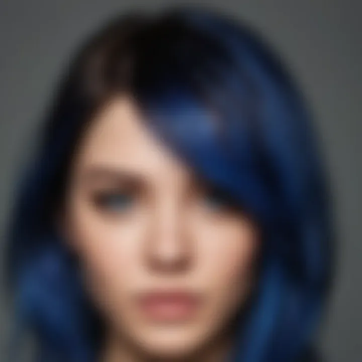 Application of temporary blue hair dye on brunette hair