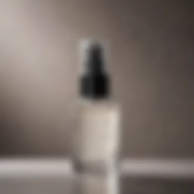 Close-up of clear fragrance-free setting spray misting gently