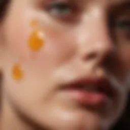 Close-up of vitamin C serum droplet on skin