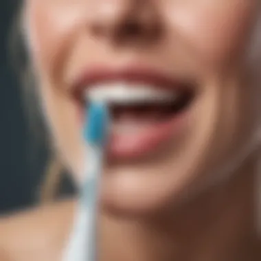 Close-up of toothbrush with integrated flosser