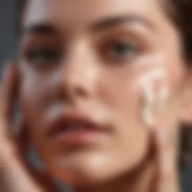 Close-up of a hand applying Roc cream on the face.