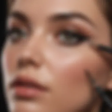 Precision Application A hand applying pencil eyeliner on eyelids with precision