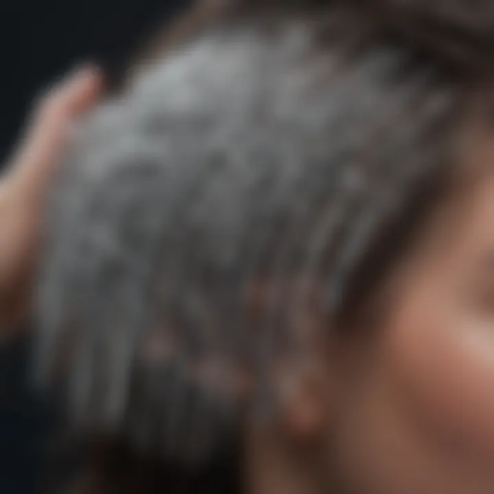 A close-up of a scalp comb designed to alleviate dandruff.