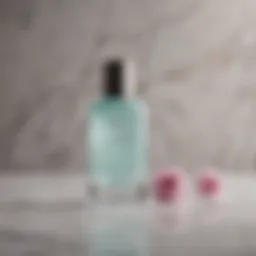 Elegant nail polish remover bottle on marble background